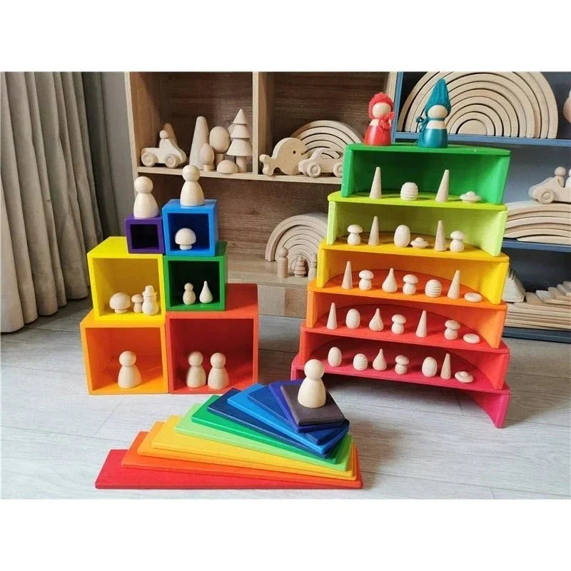 Premium Montessori wooden toys including stacking stones, arch sets, and building blocks from Oliver and Company