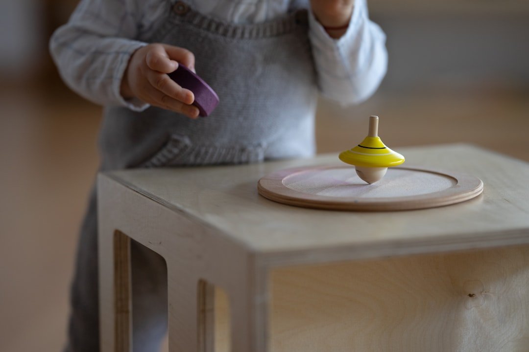 Montessori home learning environment with wooden toys and organized shelf