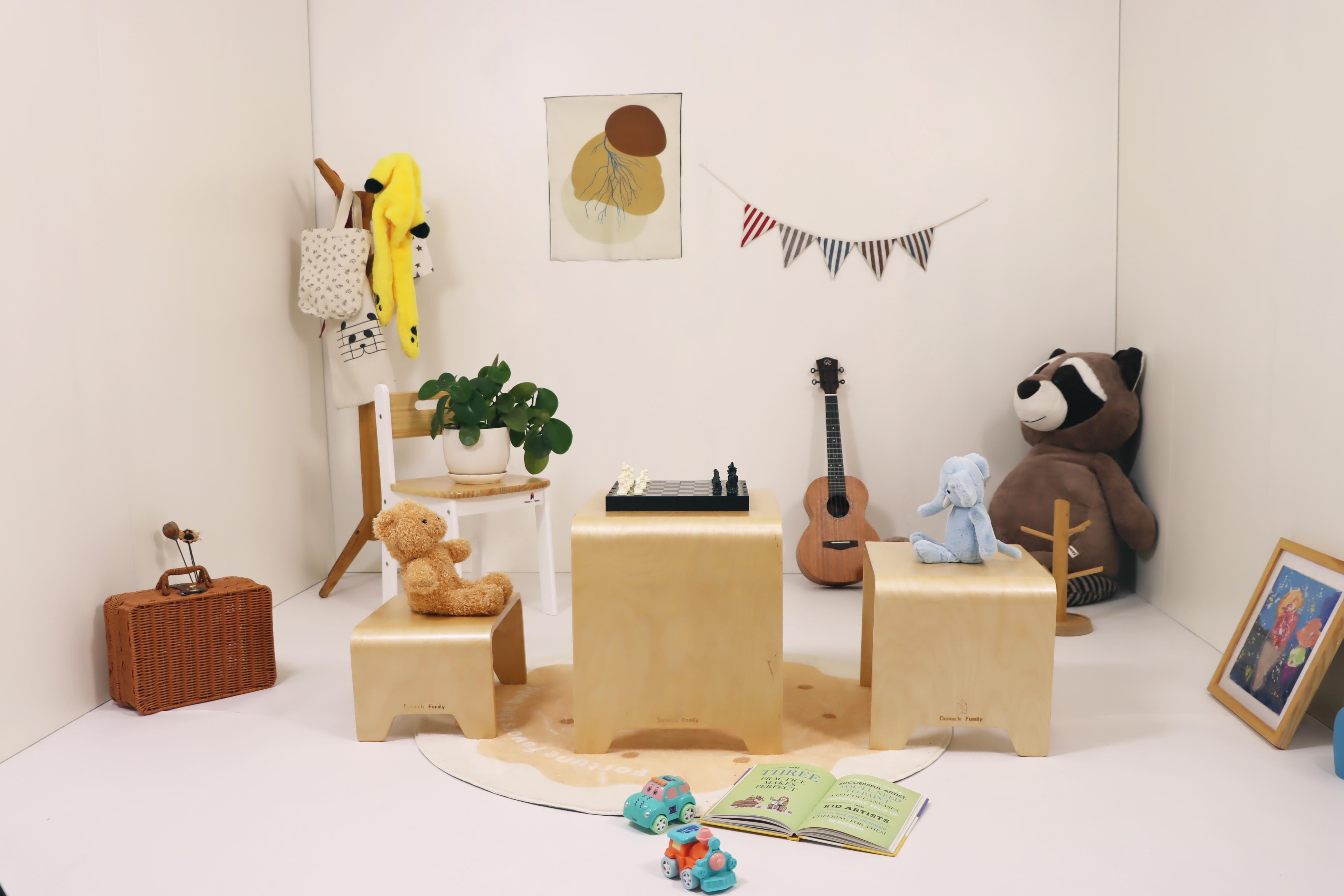 Montessori furniture for children including child-sized tables, chairs, and learning activity sets