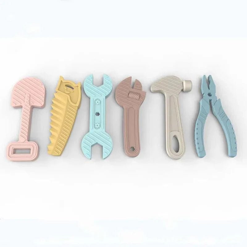 6pcs Silicone Tool Teether Set featuring tool-shaped silicone teethers designed for soothing teething relief and sensory exploration, available at Oliver & Company Montessori Toys.
