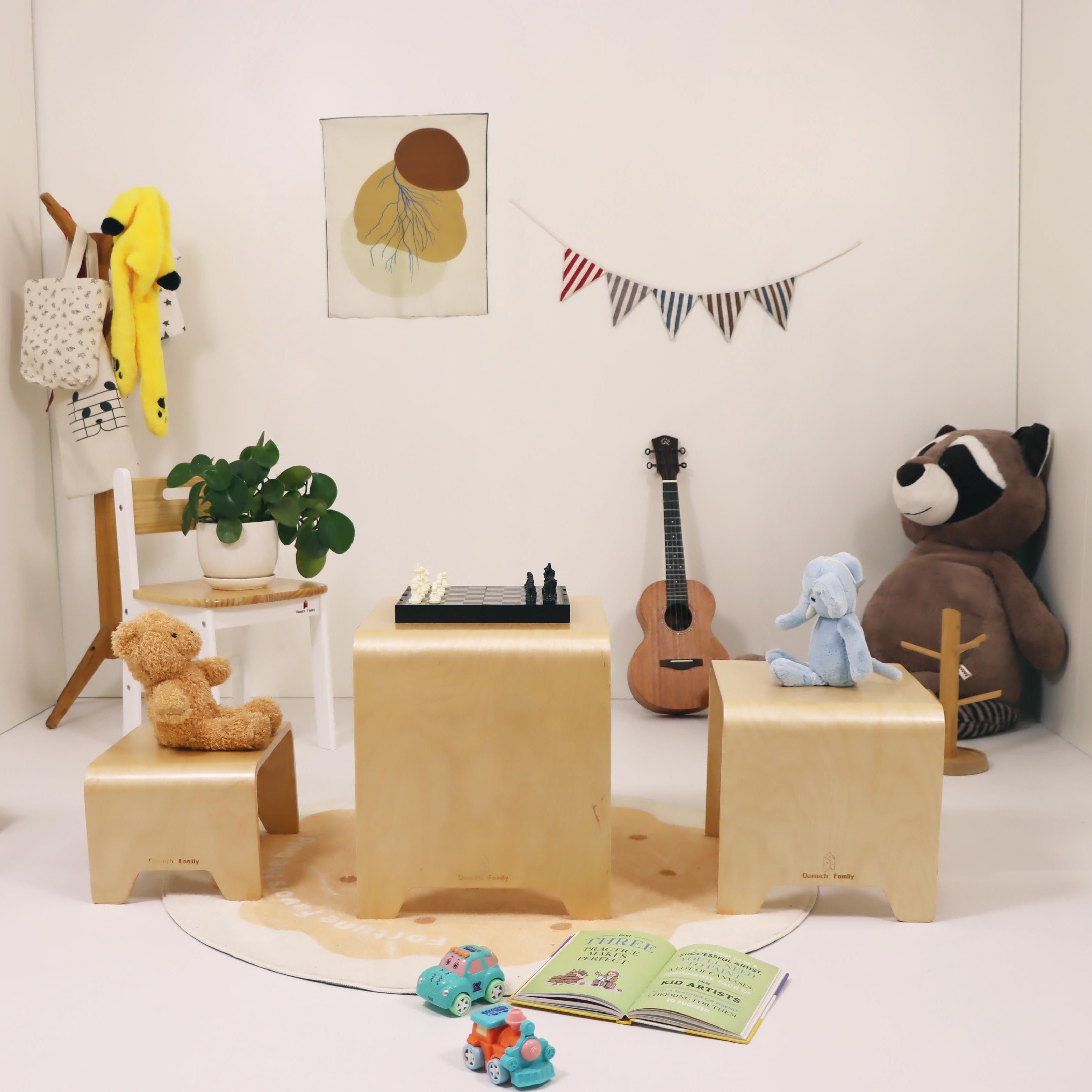 Children's playroom with wooden furniture, toys, and decorative items.