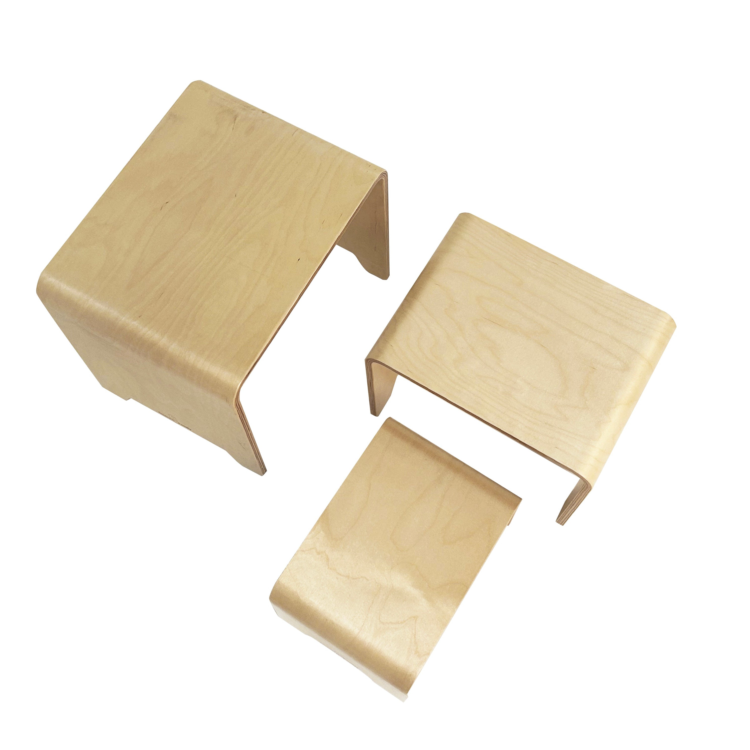 Three beige square stools on a white background