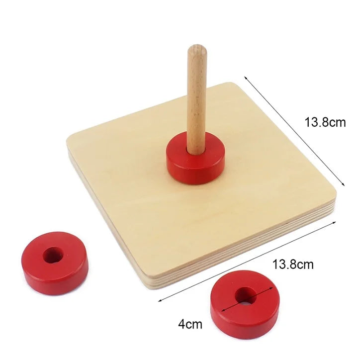 Single disc on vertical dowel activity