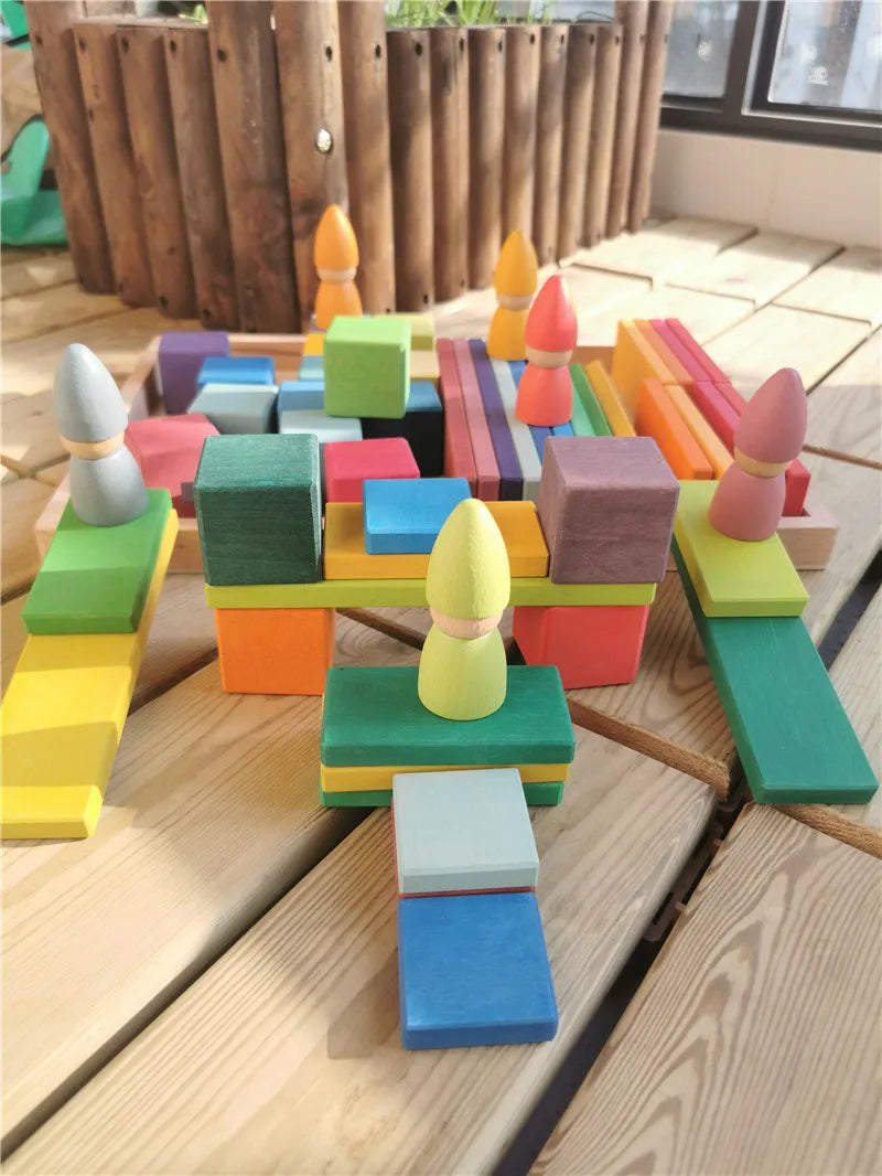 Colorful wooden building blocks on a wooden surface