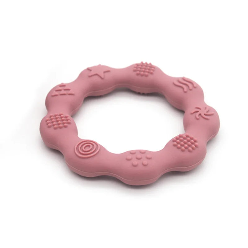 Powder rose wavy silicone teething ring