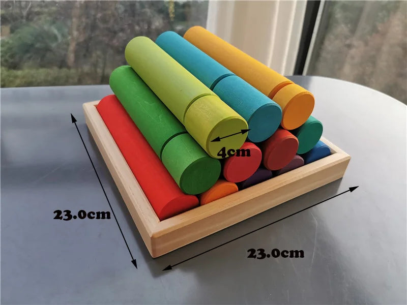 Colorful wooden stacking toy with dimensions on a reflective surface