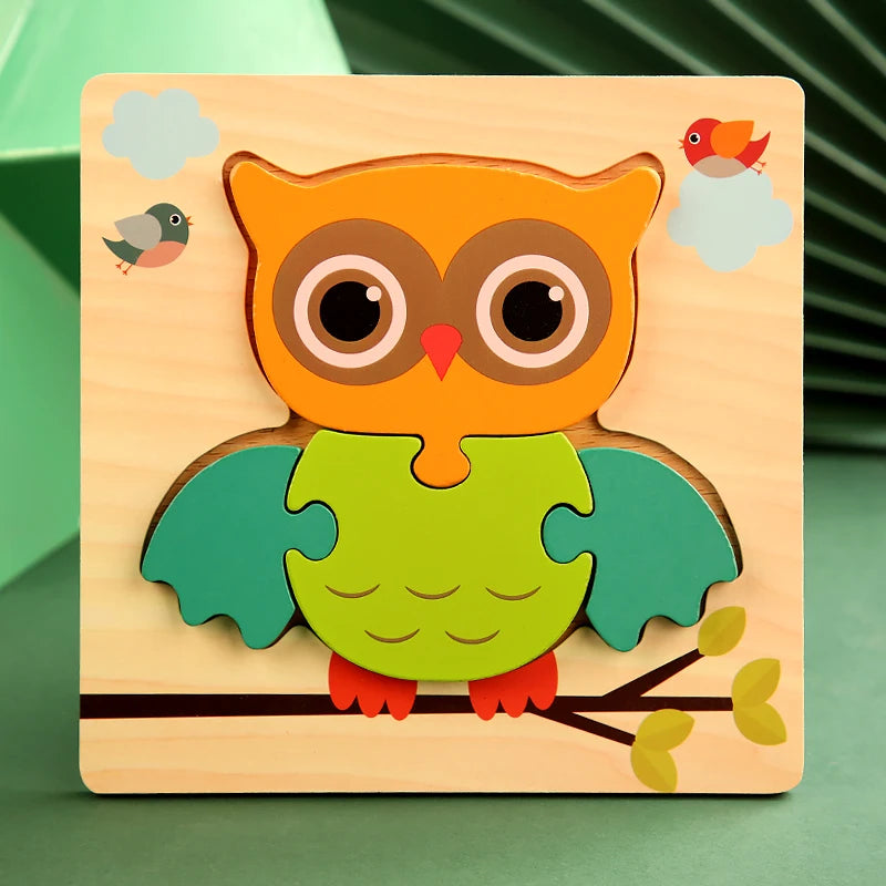 Wooden owl puzzle toy on a green background