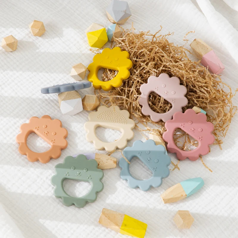 Sunflower teethers with wooden blocks and straw