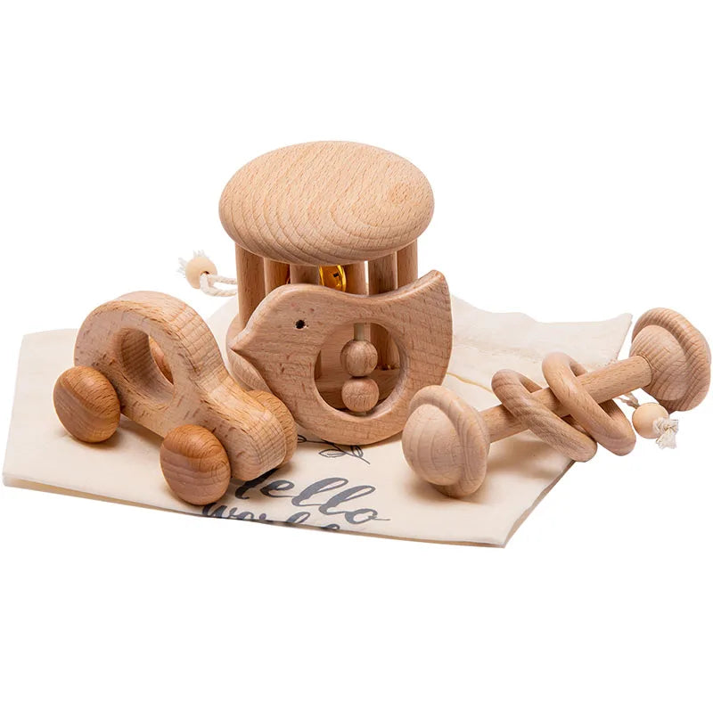 Montessori Baby Beech Wood Rattle Sets featuring wooden toys, including a bird, car, and knot, designed to enhance motor skills and auditory senses for infants.
