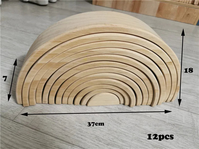 Wooden archs on a gray floor with measurements indicated