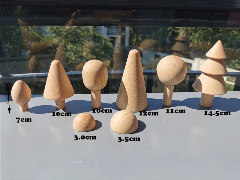 Set of wooden mushroom-shaped objects with measurements on a reflective surface.
