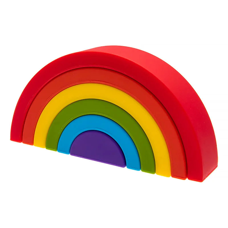 Colorful rainbow-shaped toy on a white background