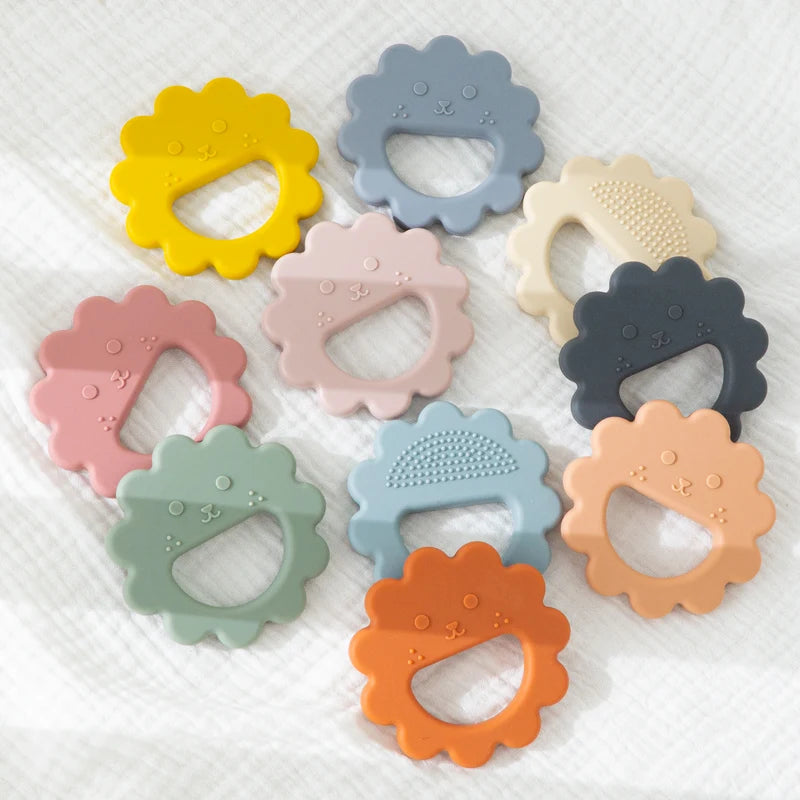 Sunflower silicone teethers spread out in a circle
