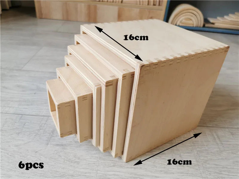 Set of six wooden boxes with dimensions labeled on a light gray floor.