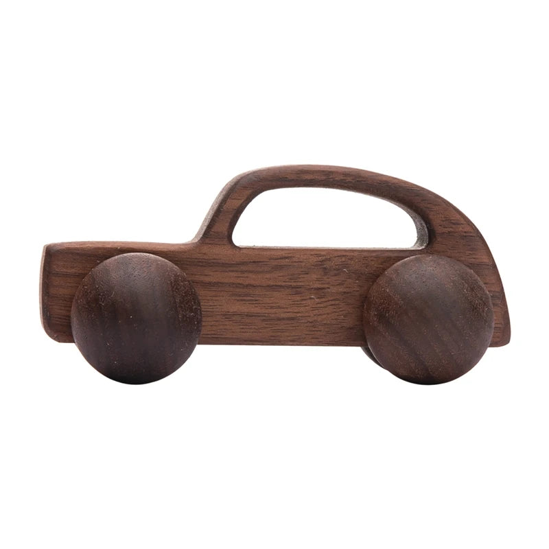 Wooden toy car on a white background