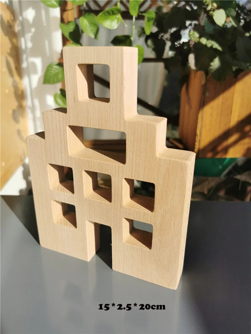 Wooden geometric block on a reflective surface with blurred background