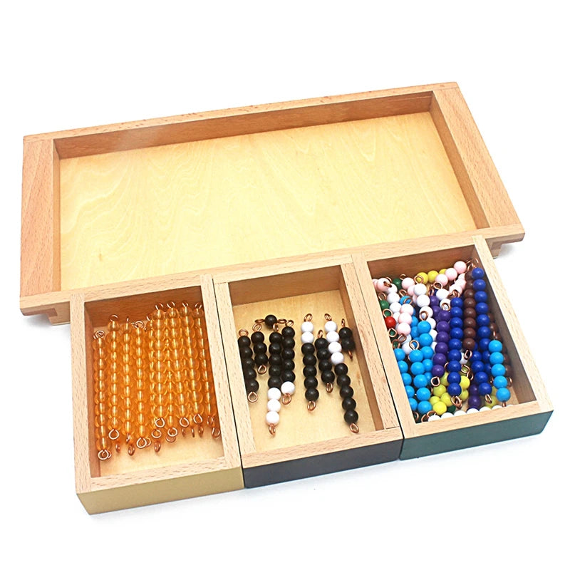 Snake game boxes in front of the wooden tray
