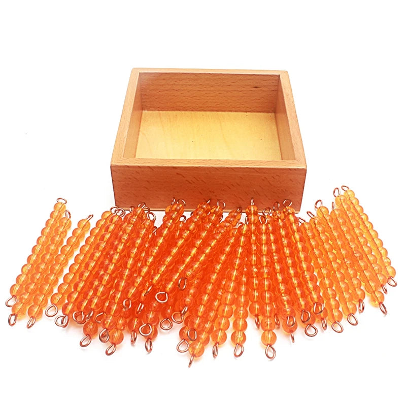Empty wooden box with golden ten bars in front