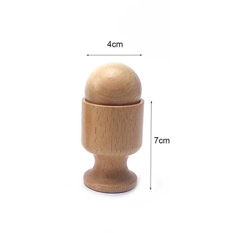 Wooden ball in a cup, 7cm tall