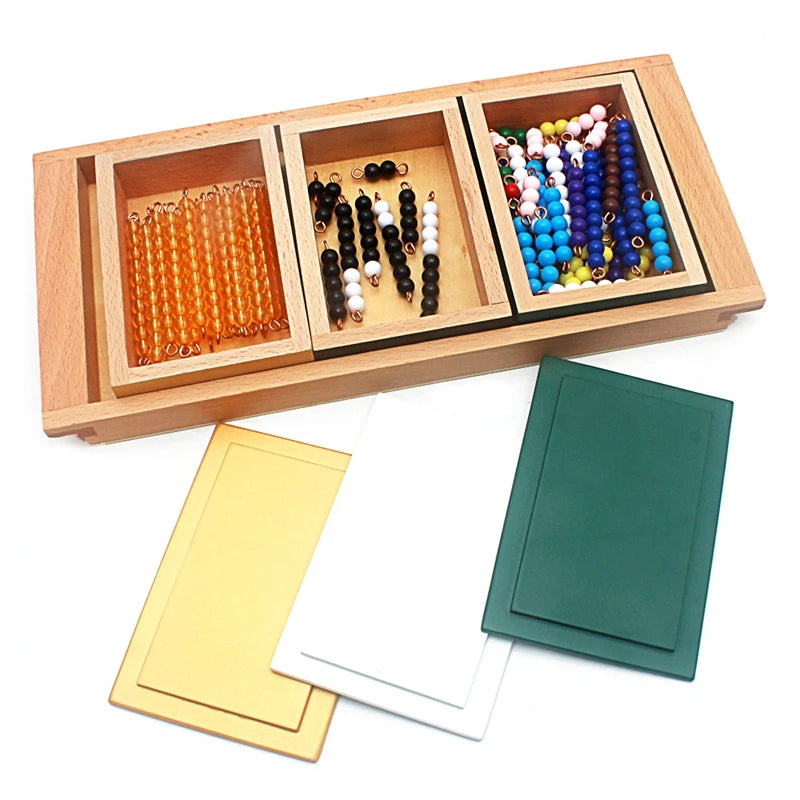 Montessori addition snake game boxes in a tray with lids