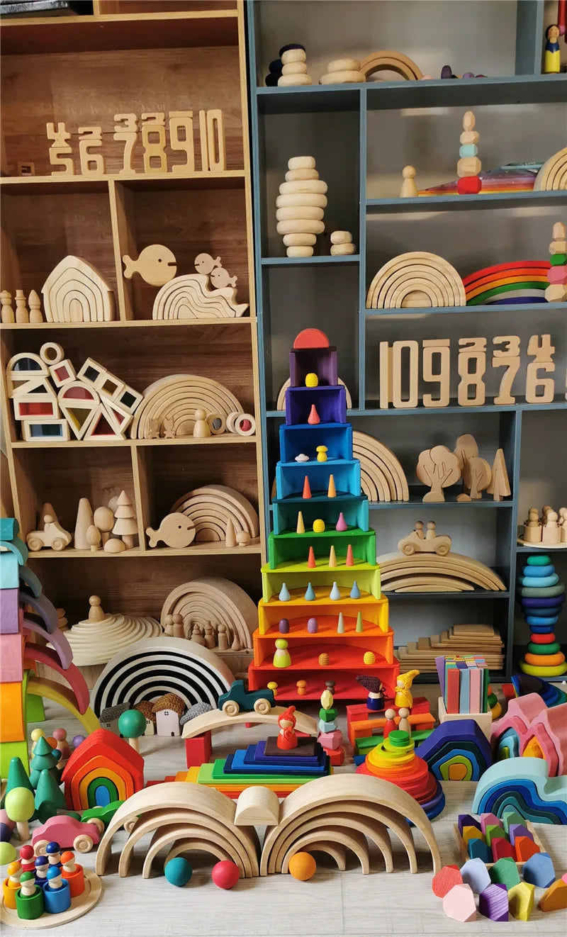 Colorful wooden toys and building blocks on shelves