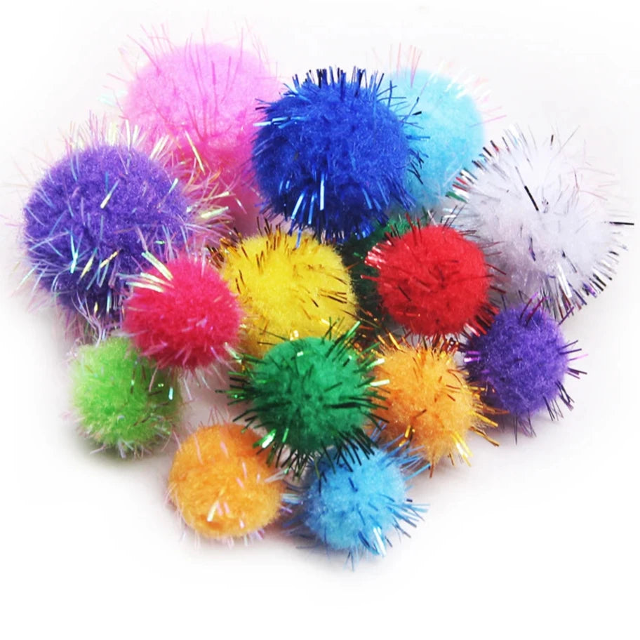 Mixed Color Glitter Pompom Balls in various sizes, perfect for crafts and DIY projects. Adds sparkle to creative endeavors. Suitable for educational and playful activities.