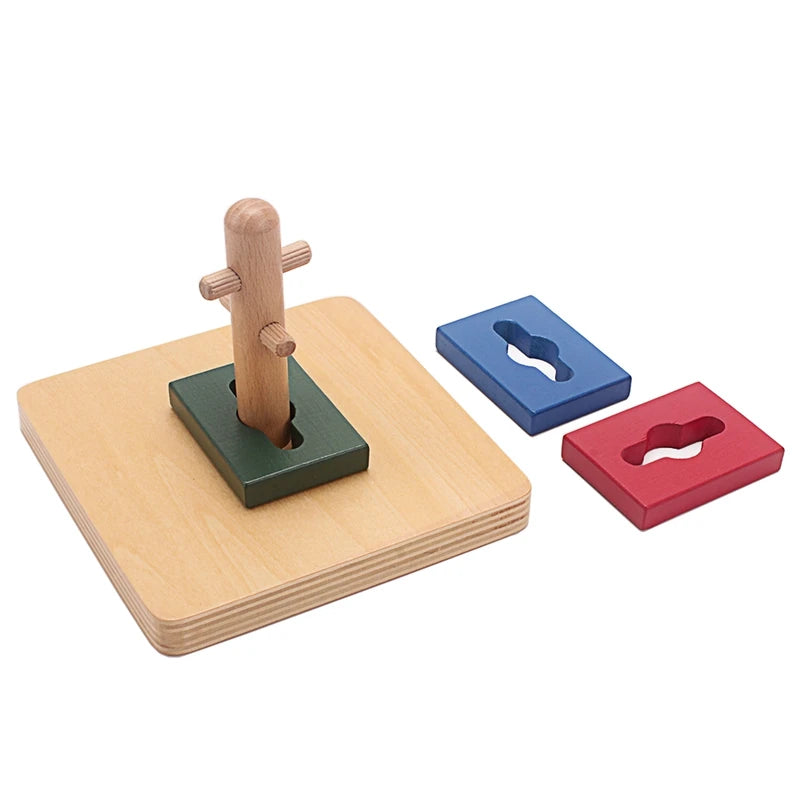 Green rectangle on the dowel with blue and red rectangles beside it