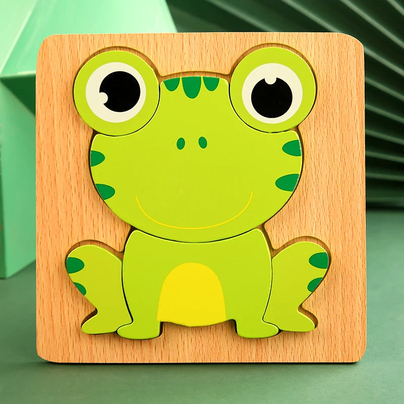 Wooden frog puzzle toy on a green background