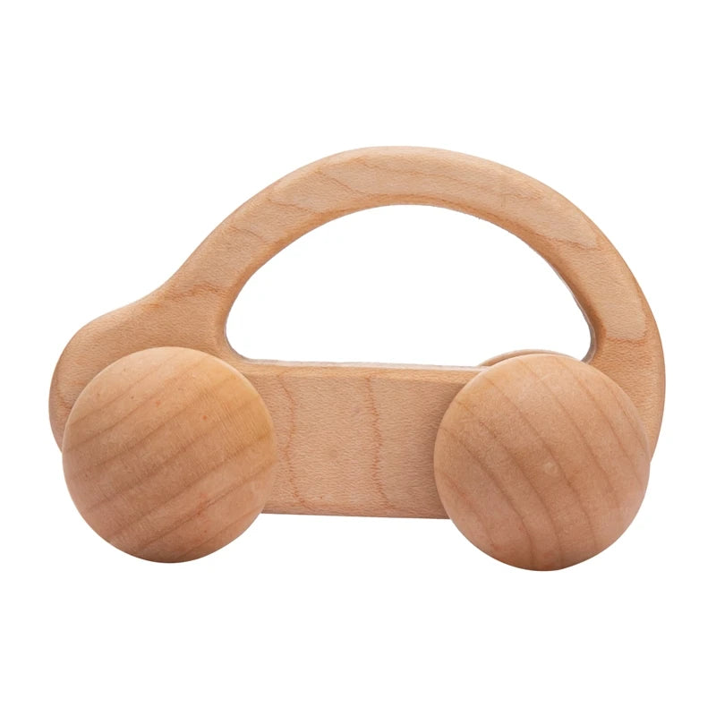 Wooden baby rattle on a white background