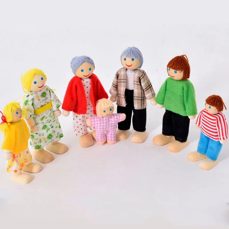 Set of colorful toy family figures on a white background