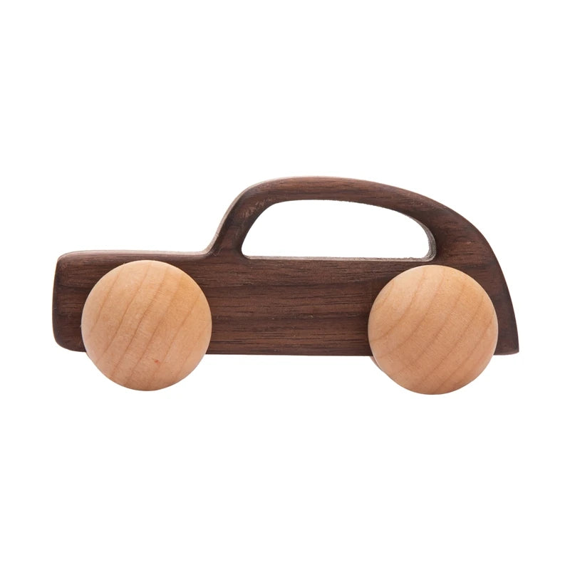Wooden toy car with a brown handle on a white background