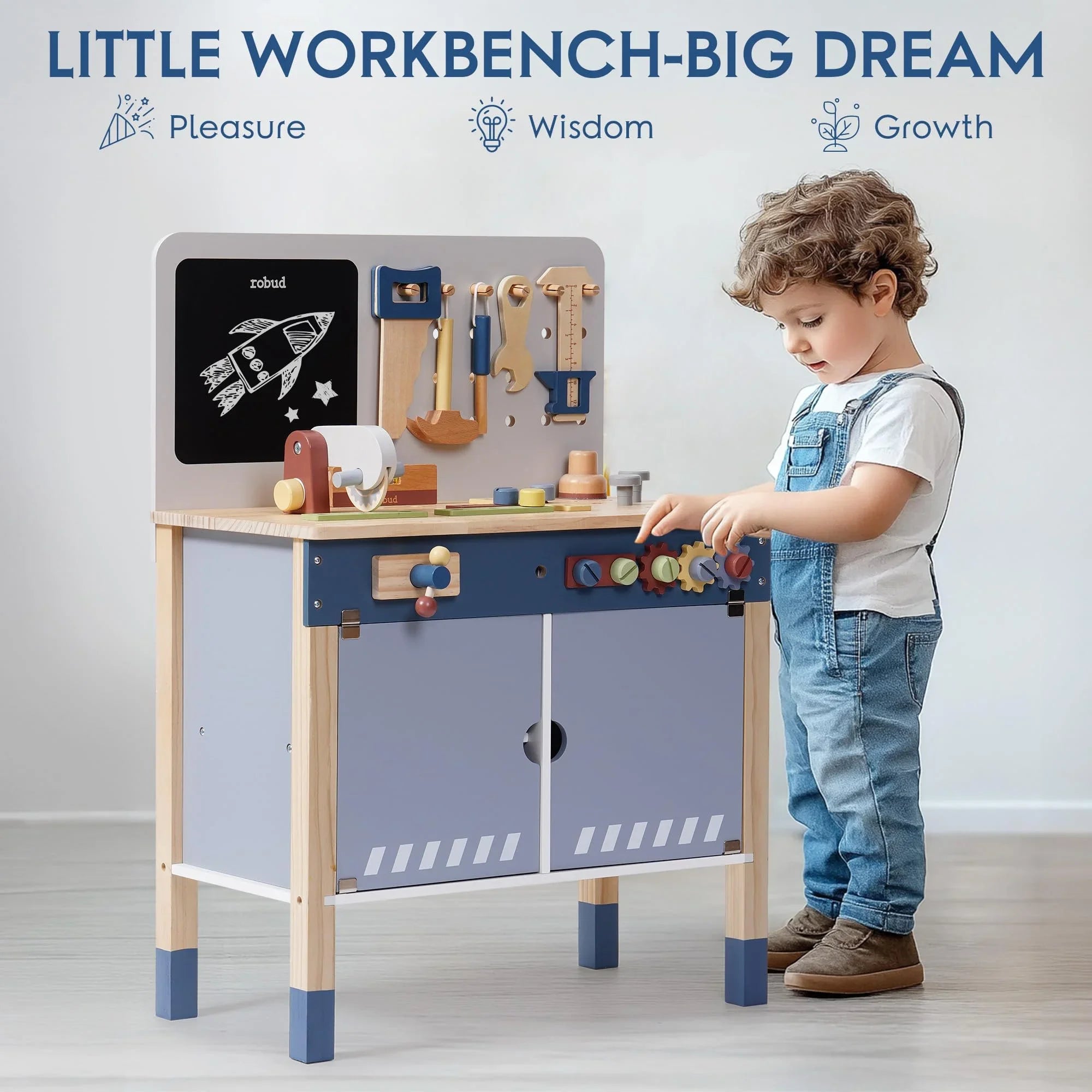 Child playing with a toy workbench in a room with a white wall.