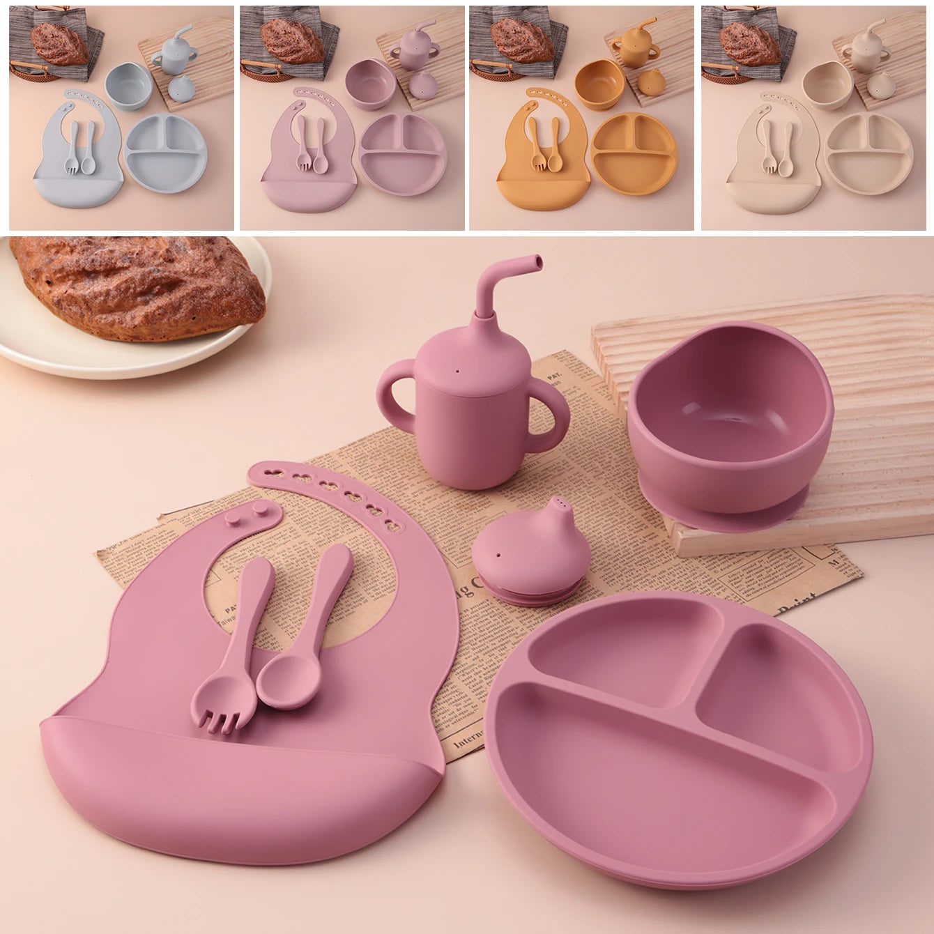 A coordinated silicone baby feeding set in a dusty pink color, including a large divided plate, bib, sippy cup, small bowl, and spoon, arranged on a tabletop with a napkin. Smaller inset images at the top show the same set in other pastel colorways.