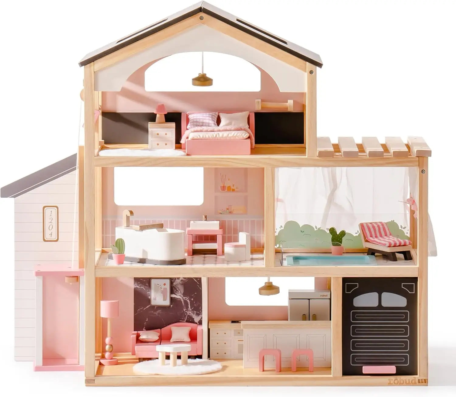 Wooden dollhouse with pink and white interior furniture on a white background