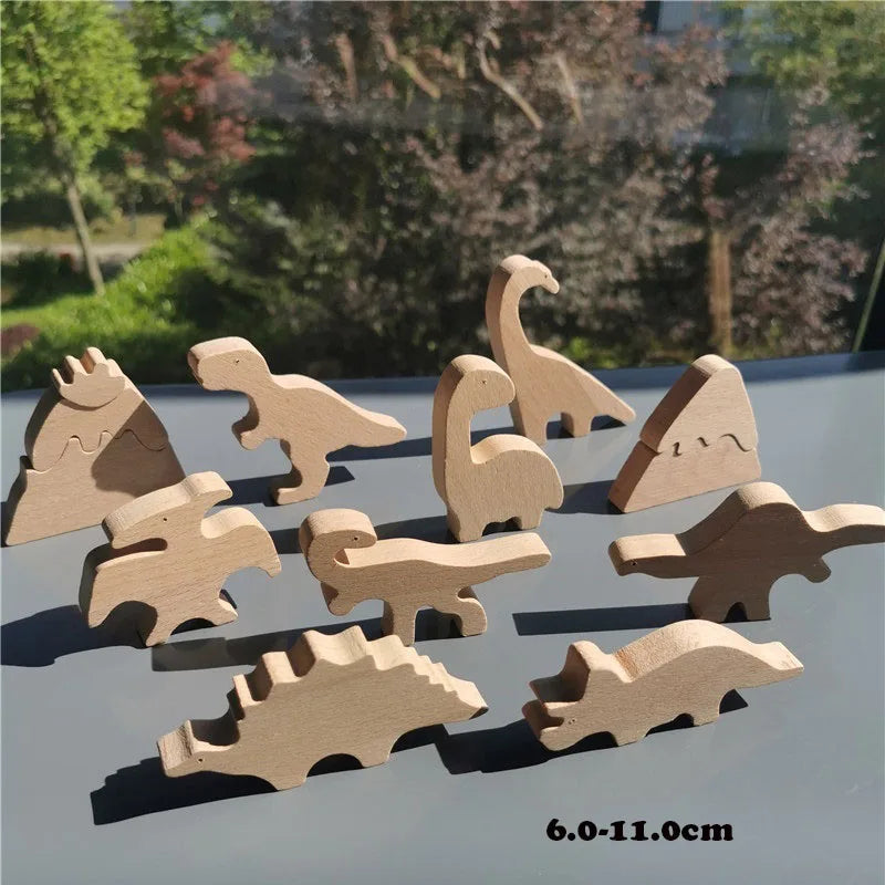 Set of wooden dinosaur toys on a flat surface with a natural background