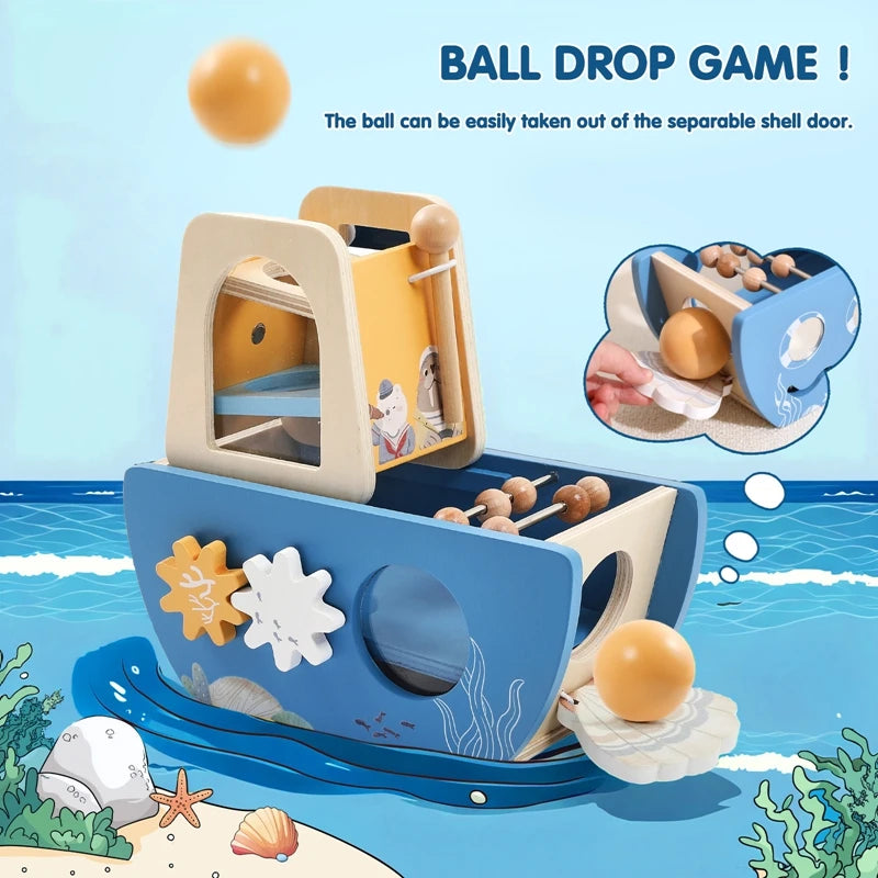 Wooden ball drop game with ocean-themed design on a blue background