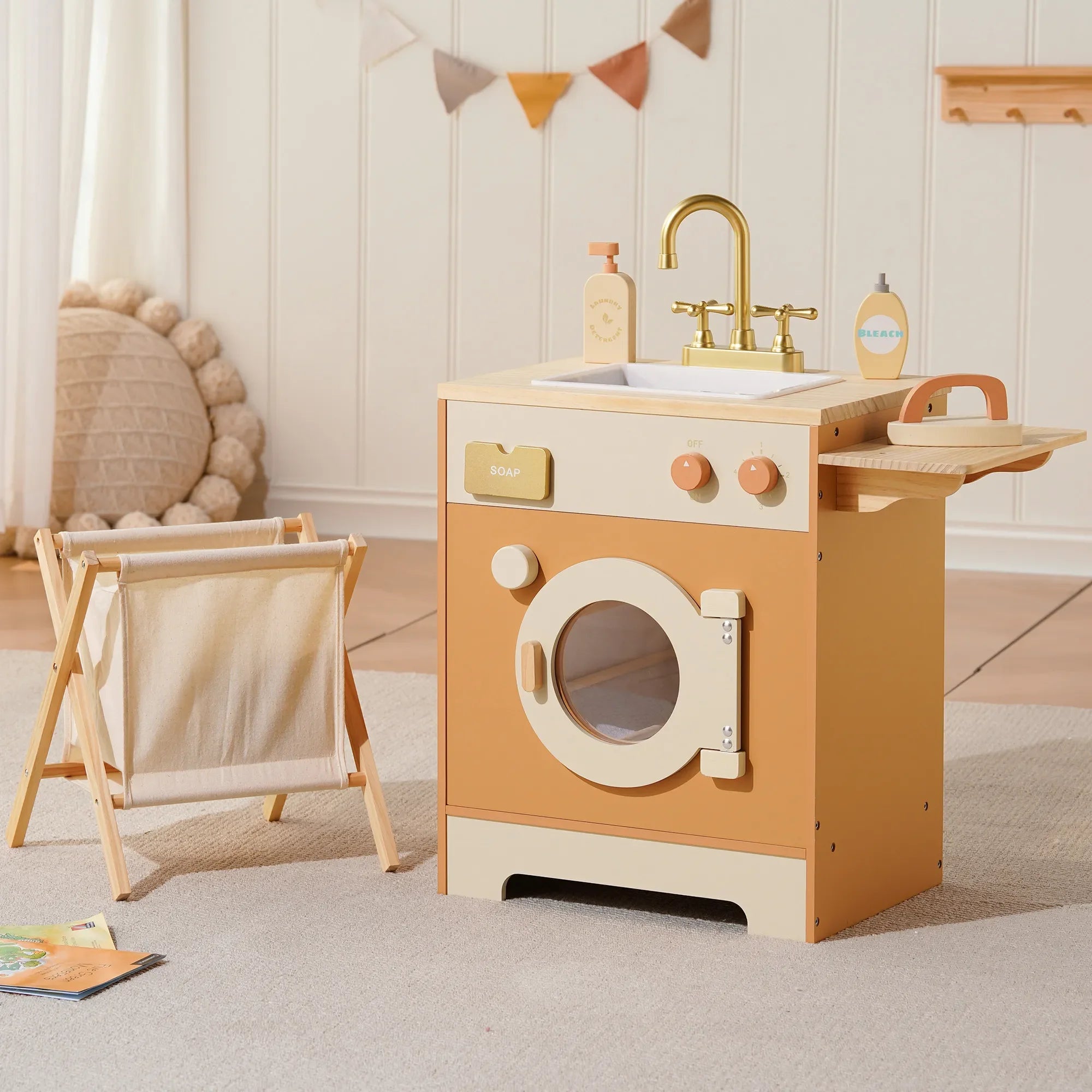 Wooden play kitchen set with sink and washing machine design in a room setting.