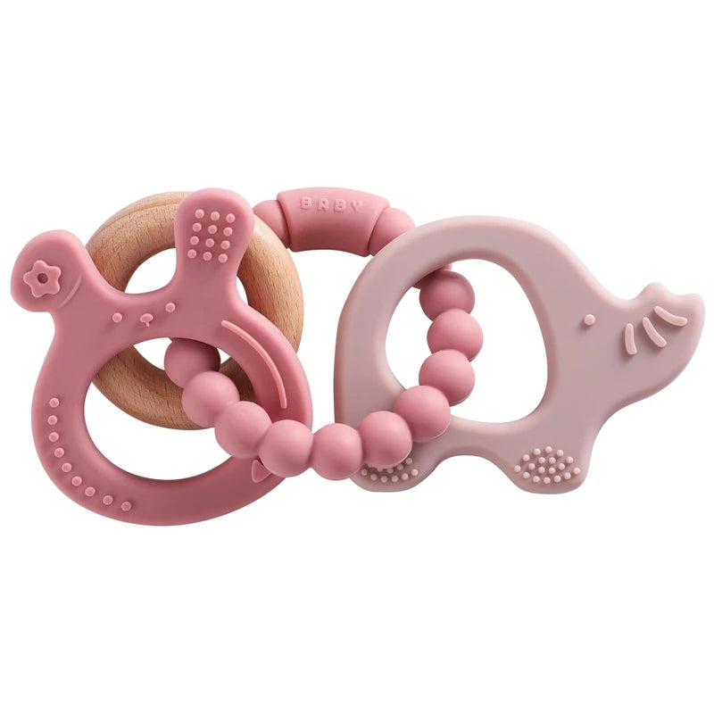 Two pink baby teething rings on a white background