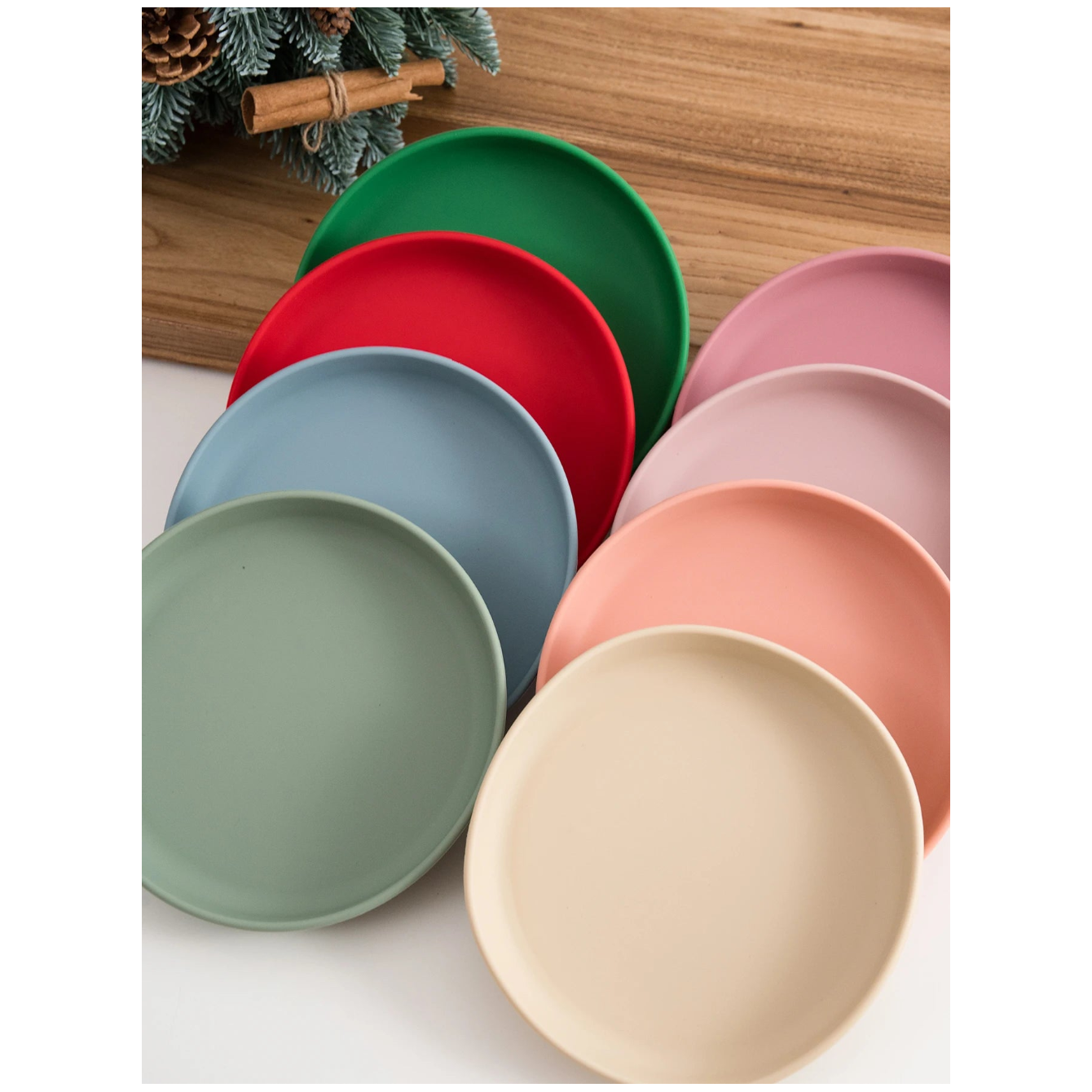 Round silicone suction plates in pastel and Christmas colors fanned out