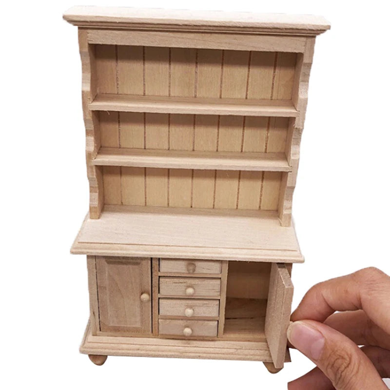 Wooden miniature bookshelf with a hand opening a drawer on a white background