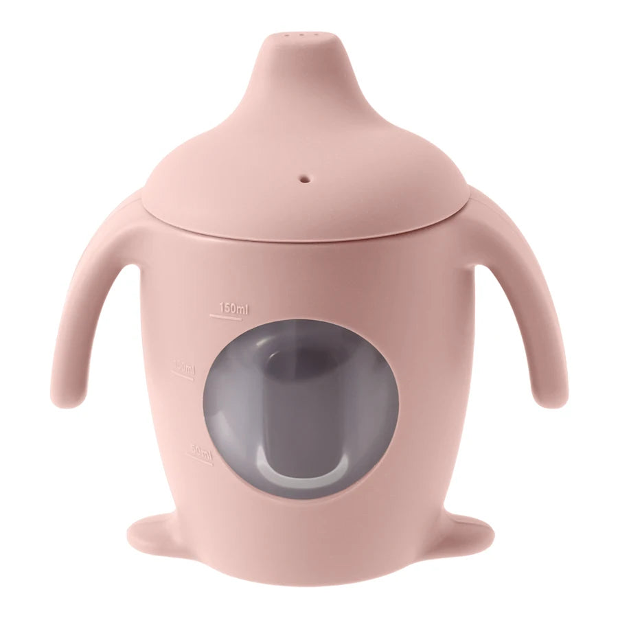 Pink sippy cup with a gray interior on a white background