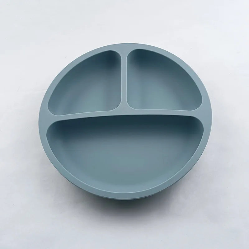 Blue divided plate on a white background