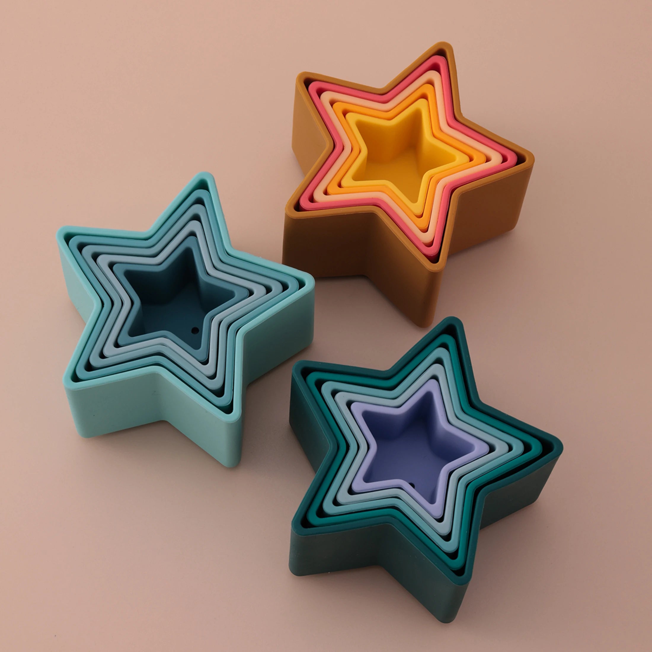 Nested silicone star cups in forest, sunset and ocean colors