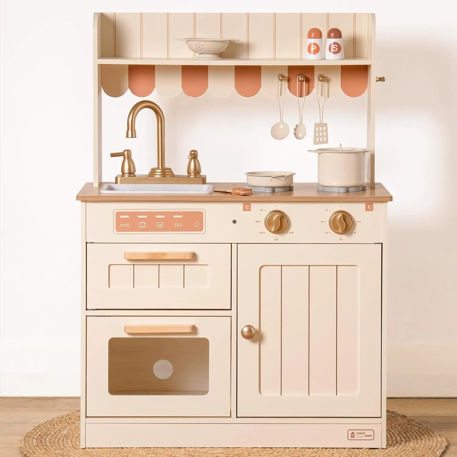 Children's play kitchen set with wooden cabinets, sink, and stove on a light background