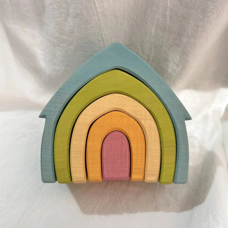 Colorful wooden rainbow toy on a white background