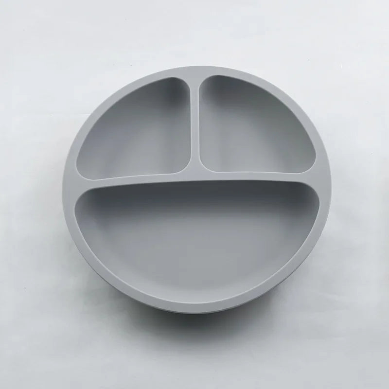 Gray divided plate on a white background