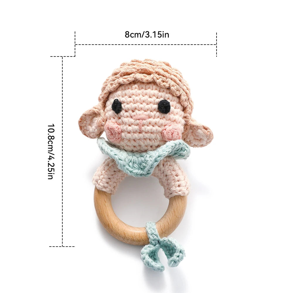 Pink crochet sheep rattle with wooden ring and dimensions