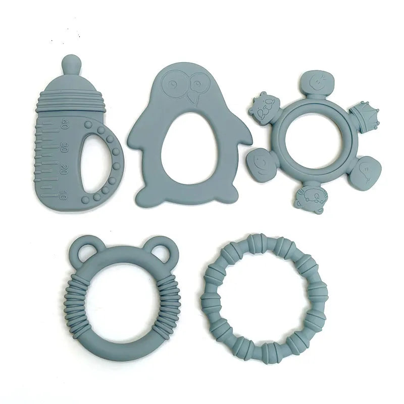 Five gray silicone baby teething toys arranged on a plain white background, 