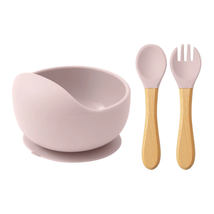 Light Pink silicone suction bowl with wooden spoon and fork