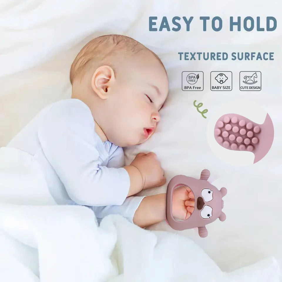 Baby lying down with a textured teething toy, featuring text about product features.